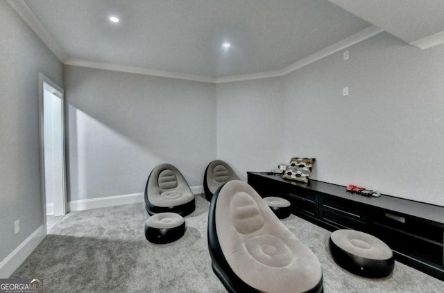 living area featuring carpet flooring and crown molding