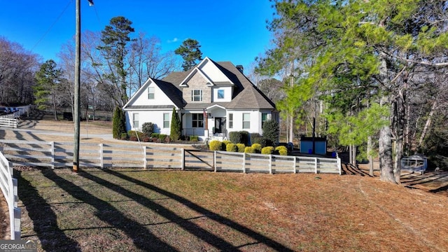 view of front of home with a front lawn