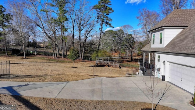 view of yard featuring a garage