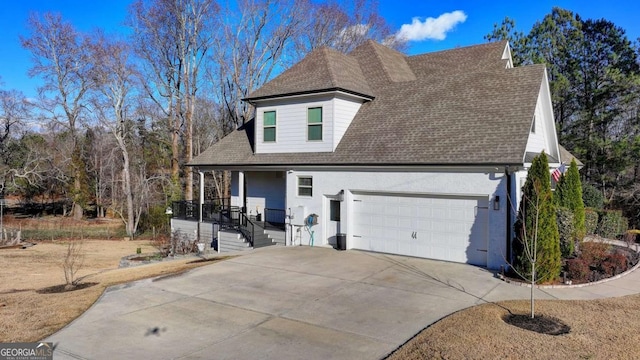 view of front of home with a garage