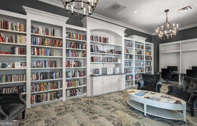 sitting room featuring crown molding, carpet, and a chandelier