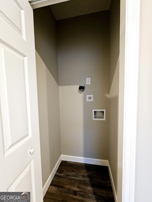 clothes washing area featuring dark wood-type flooring and hookup for a washing machine