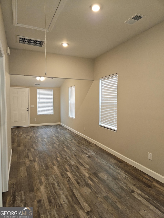 unfurnished room with dark hardwood / wood-style floors