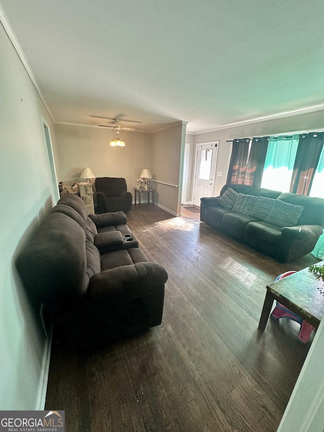 living room with crown molding, ceiling fan, and hardwood / wood-style flooring