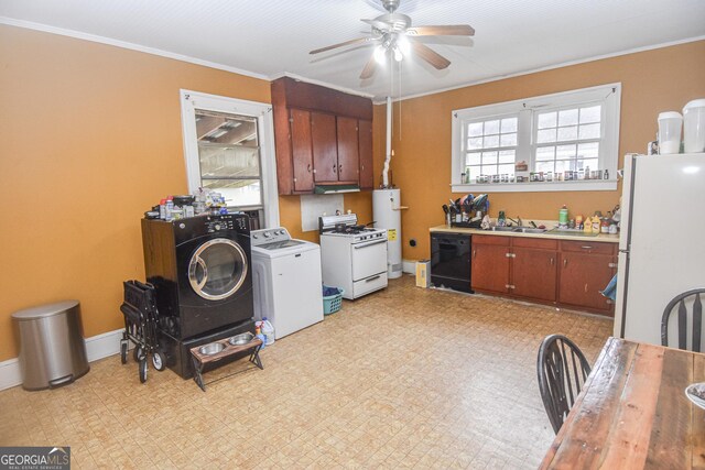 laundry room featuring washer and clothes dryer, plenty of natural light, ceiling fan, and ornamental molding