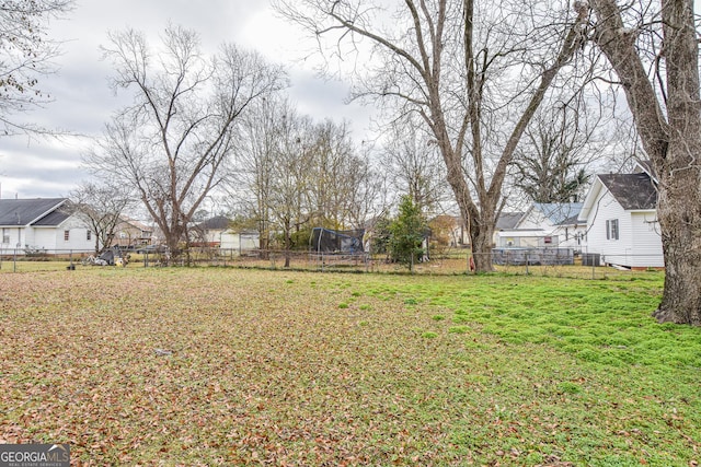 view of yard with a trampoline