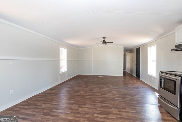 interior space featuring stainless steel electric range, vaulted ceiling, ceiling fan, dark hardwood / wood-style flooring, and white cabinetry