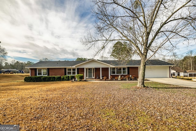 single story home with a garage