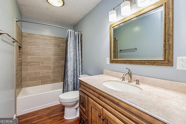 full bathroom with shower / tub combo, vanity, toilet, and wood-type flooring