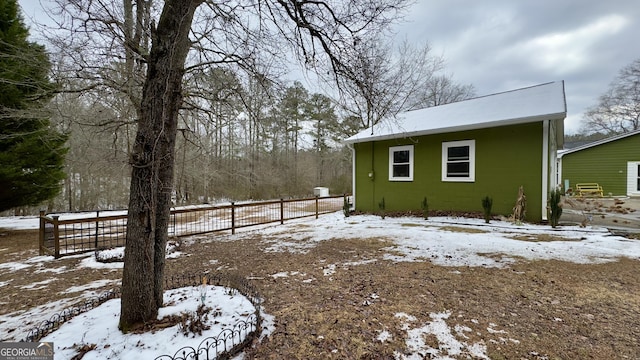 view of yard covered in snow