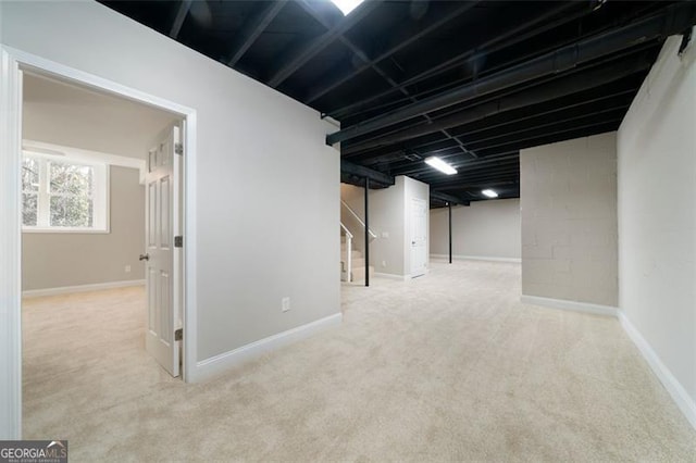 basement with light carpet