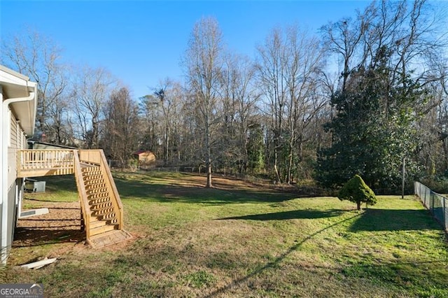 view of yard featuring a wooden deck