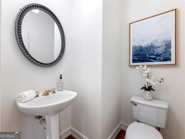 2750 Olde Towne Pkwy, Duluth, GA 30097 - half bathroom featuring toilet