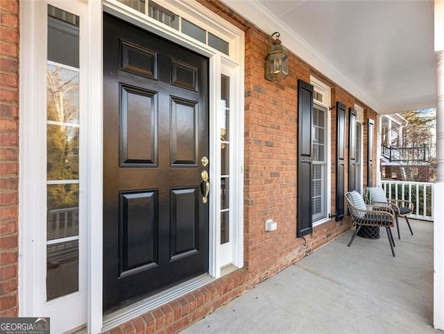 2750 Olde Towne Pkwy, Duluth, GA 30097 - property entrance featuring covered porch and brick siding