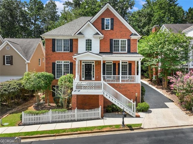 view of front of property featuring covered porch