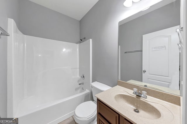 full bathroom with tile patterned flooring, vanity, shower / bath combination, and toilet