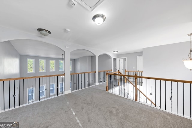 corridor featuring carpet floors