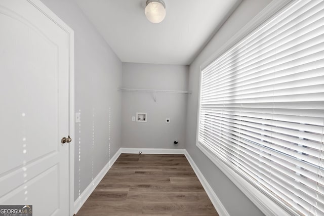 clothes washing area featuring hookup for an electric dryer, dark hardwood / wood-style flooring, and hookup for a washing machine