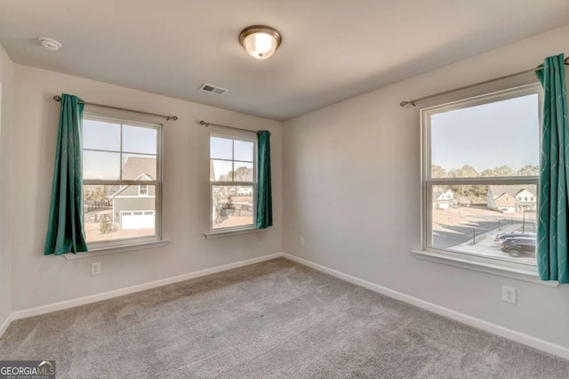 view of carpeted spare room