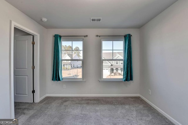 view of carpeted spare room