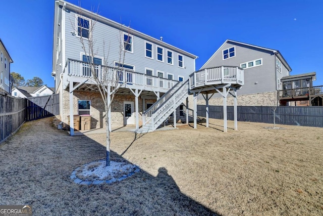 rear view of property with a deck