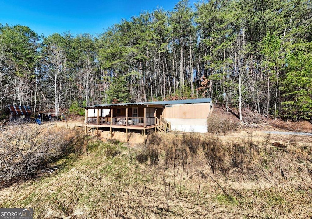 view of front of house featuring a deck