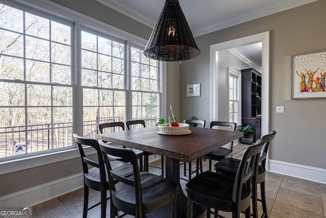 tiled dining area with crown molding