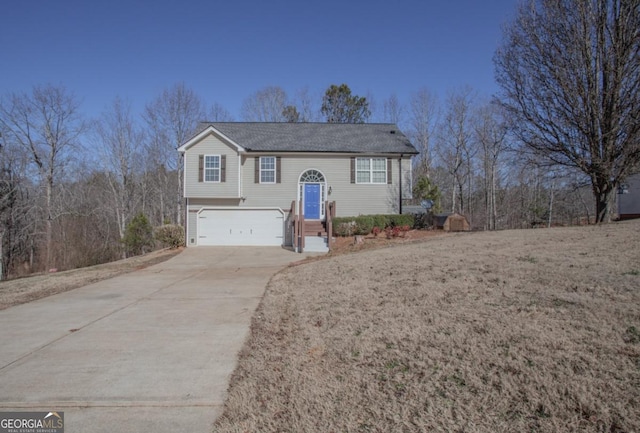 bi-level home featuring a garage