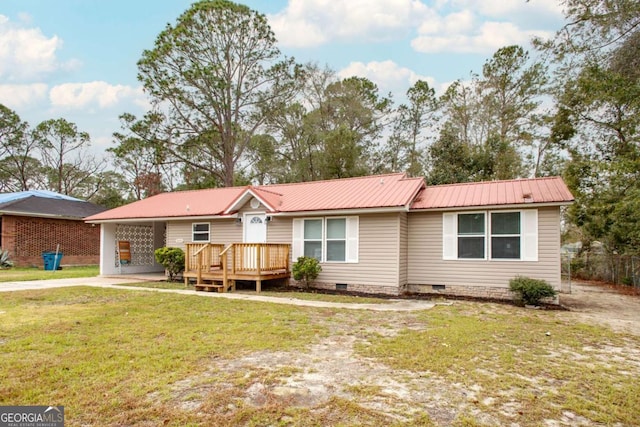 ranch-style house with a deck and a front lawn