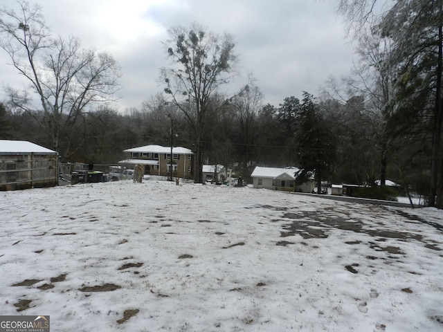 view of yard covered in snow