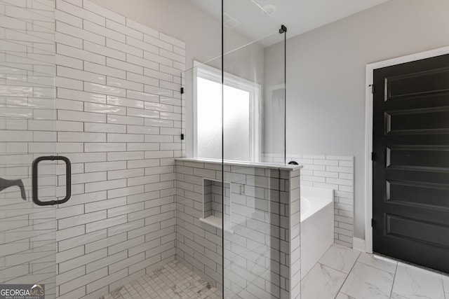 bathroom with plus walk in shower and tile walls