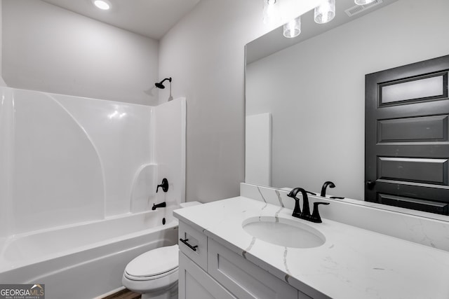 full bathroom with vanity, toilet, and tub / shower combination