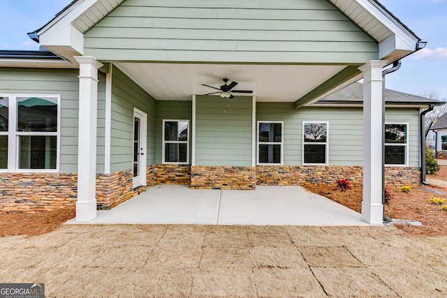 view of patio with ceiling fan