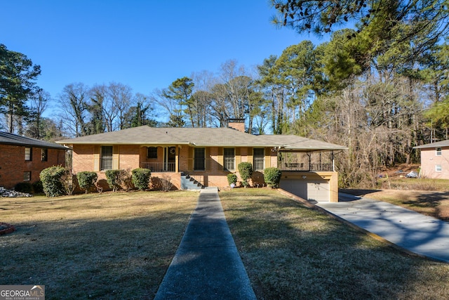 ranch-style house featuring a carport, a garage, a porch, and a front yard