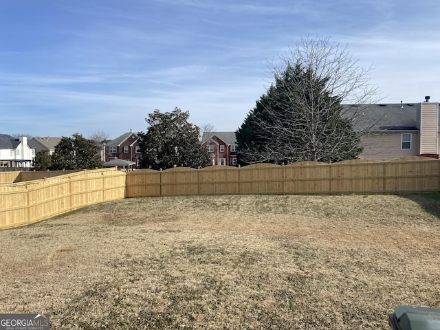 view of yard featuring fence