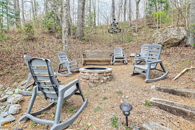 view of yard featuring a fire pit