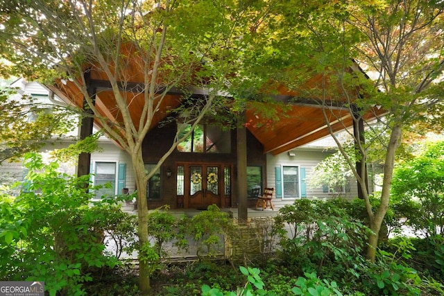 property entrance featuring french doors