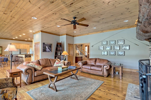 living room with ceiling fan, light hardwood / wood-style flooring, wooden ceiling, and ornamental molding