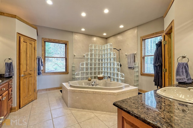 bathroom featuring tile patterned flooring, vanity, and independent shower and bath