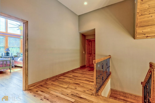 corridor with light wood-type flooring