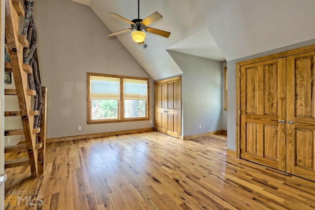 bonus room with light wood-type flooring, ceiling fan, and lofted ceiling