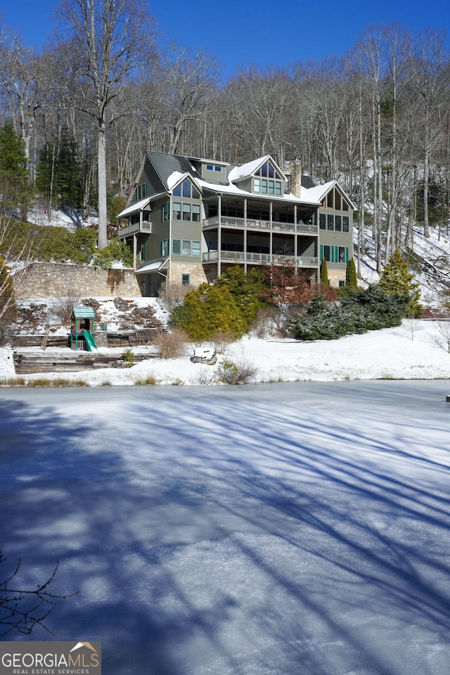 view of snow covered property