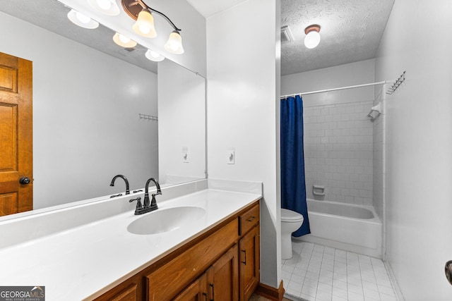 full bathroom with vanity, shower / bath combination with curtain, a textured ceiling, and toilet