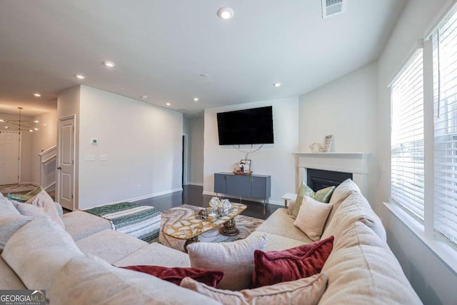 living room featuring hardwood / wood-style floors and a wealth of natural light