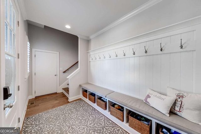 mudroom with ornamental molding, recessed lighting, baseboards, and wood finished floors