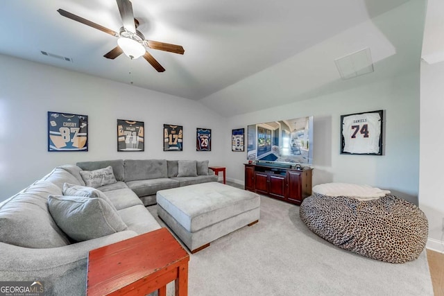 living room with visible vents, baseboards, light colored carpet, lofted ceiling, and ceiling fan