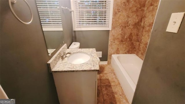 bathroom with tile patterned flooring and vanity