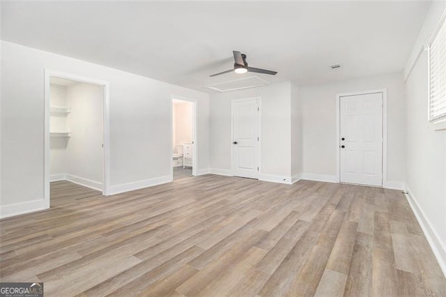 unfurnished room with ceiling fan and light hardwood / wood-style floors