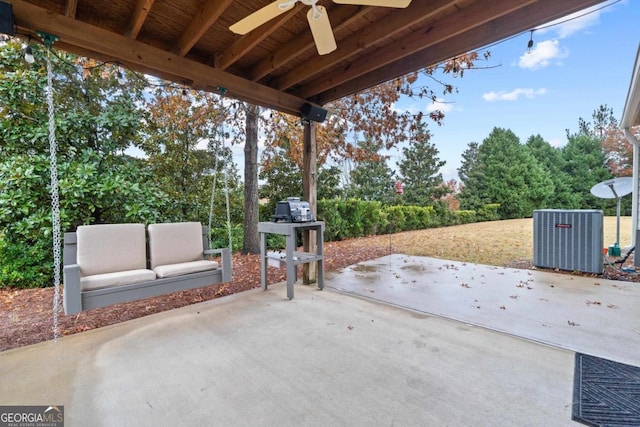 view of patio with central air condition unit, ceiling fan, and an outdoor living space