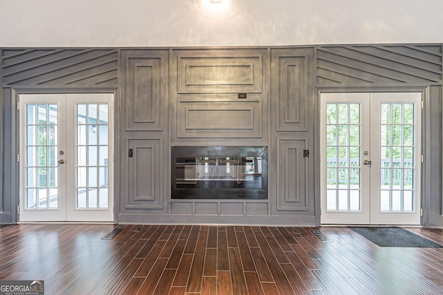 doorway to outside with french doors and dark hardwood / wood-style floors